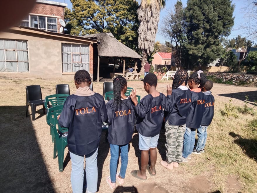 TOLA